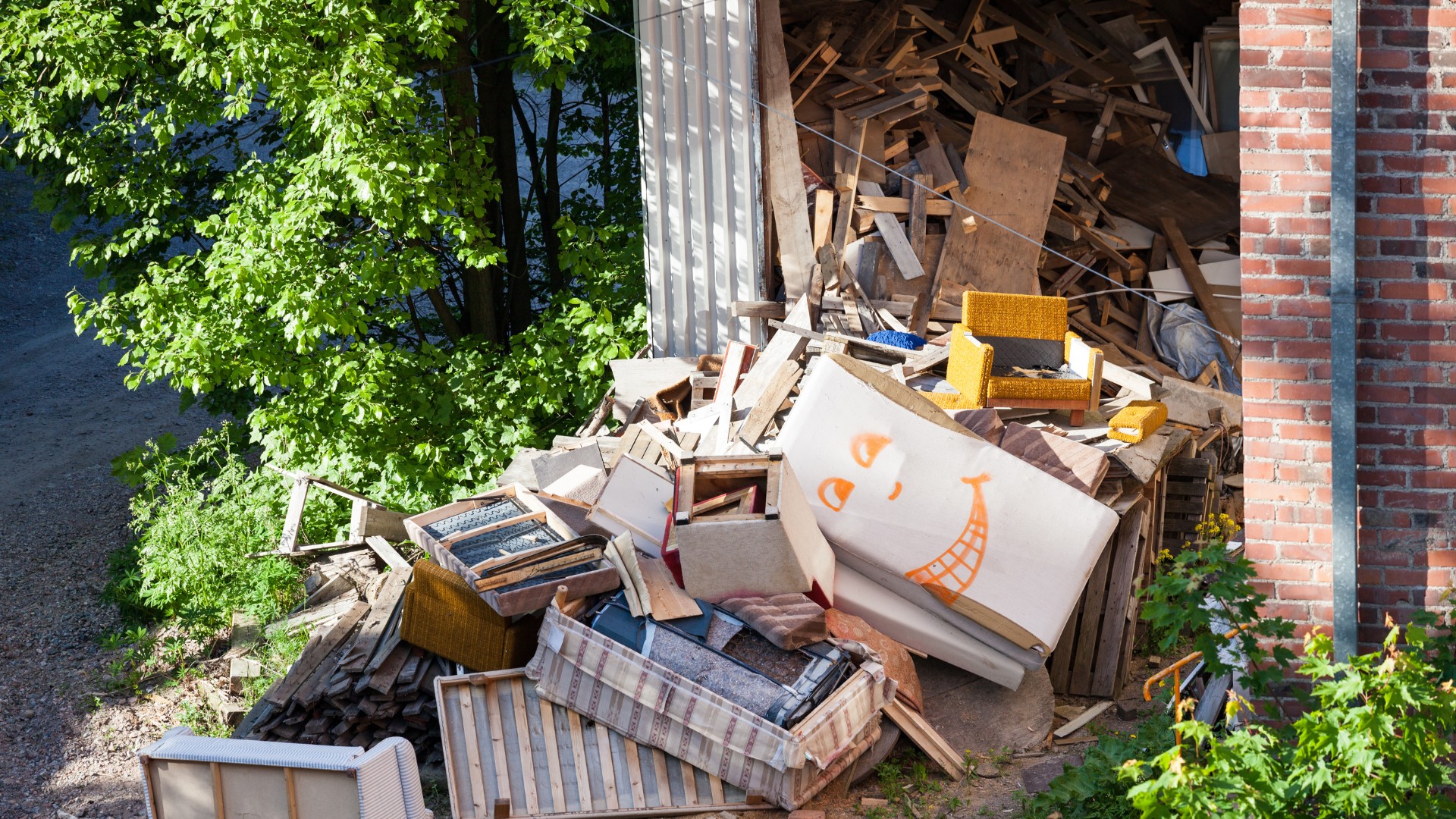 A bunch of junk in front of a garage in Ajax, Toronto.